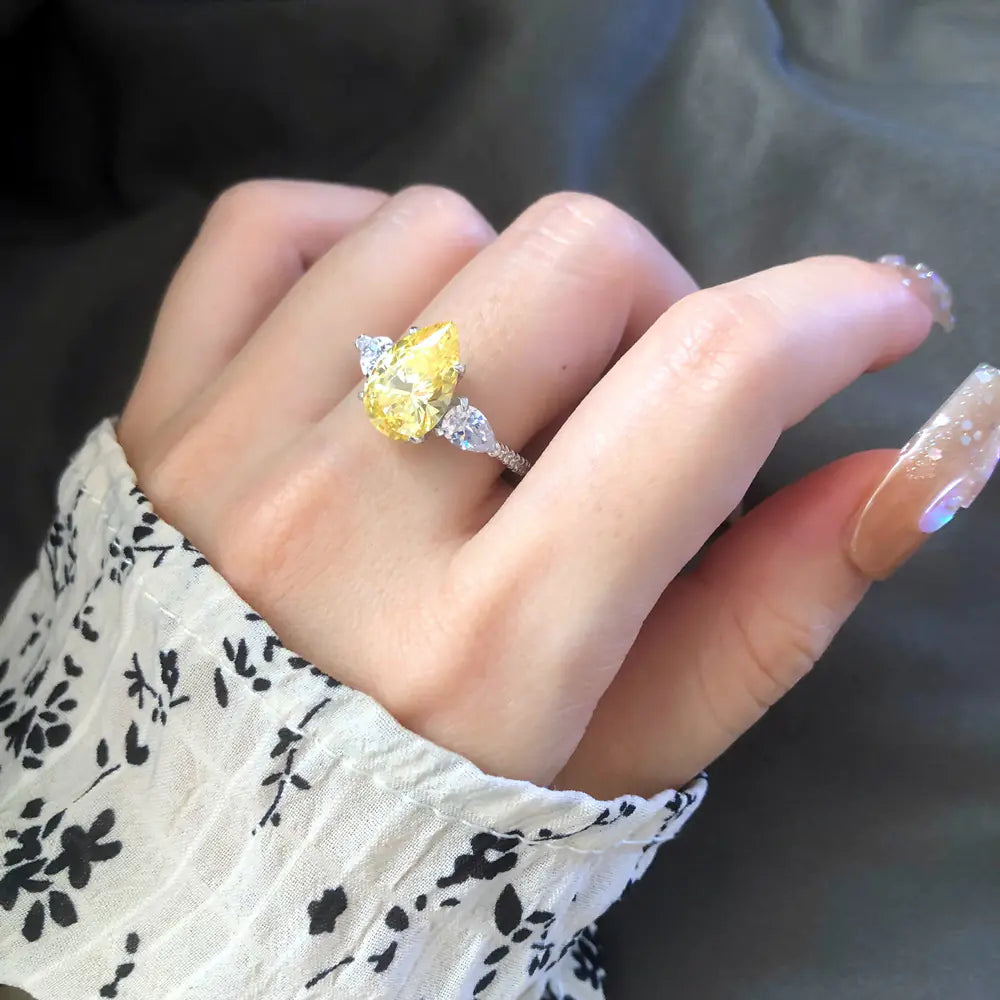 Drop-Shaped Diamond Ring in Sterling Silver – Purple, White & Yellow Options